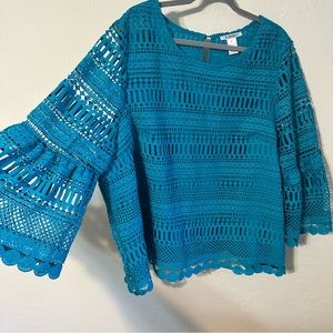 K JORDAN. teal long sleeve lace blouse with fabric shirt underneath.